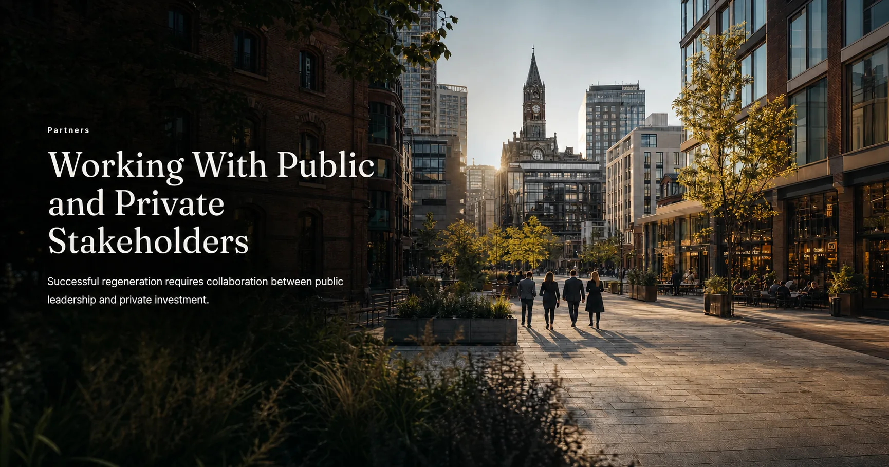 Public and private stakeholders walking through a regenerated UK city-centre district